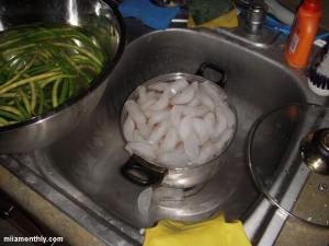 Cooked carrots cooling in the sink